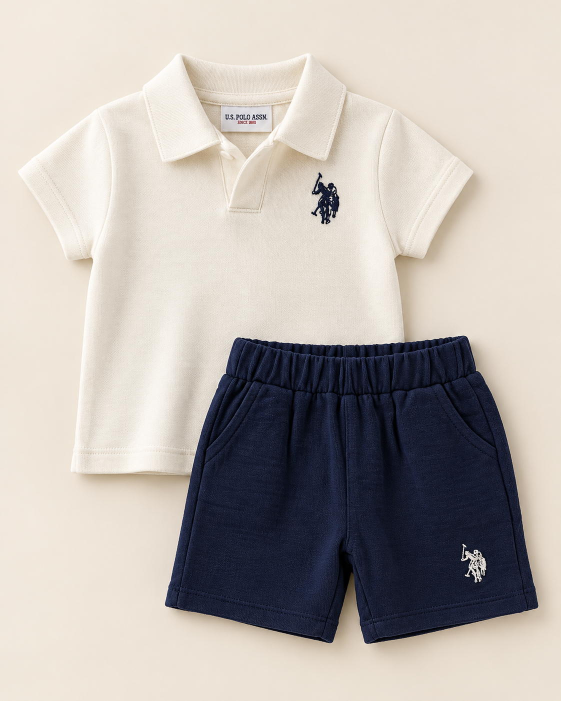 Ensemble bébé garçon US Polo polo écru et short bleu marine – 6 mois à 3 ans