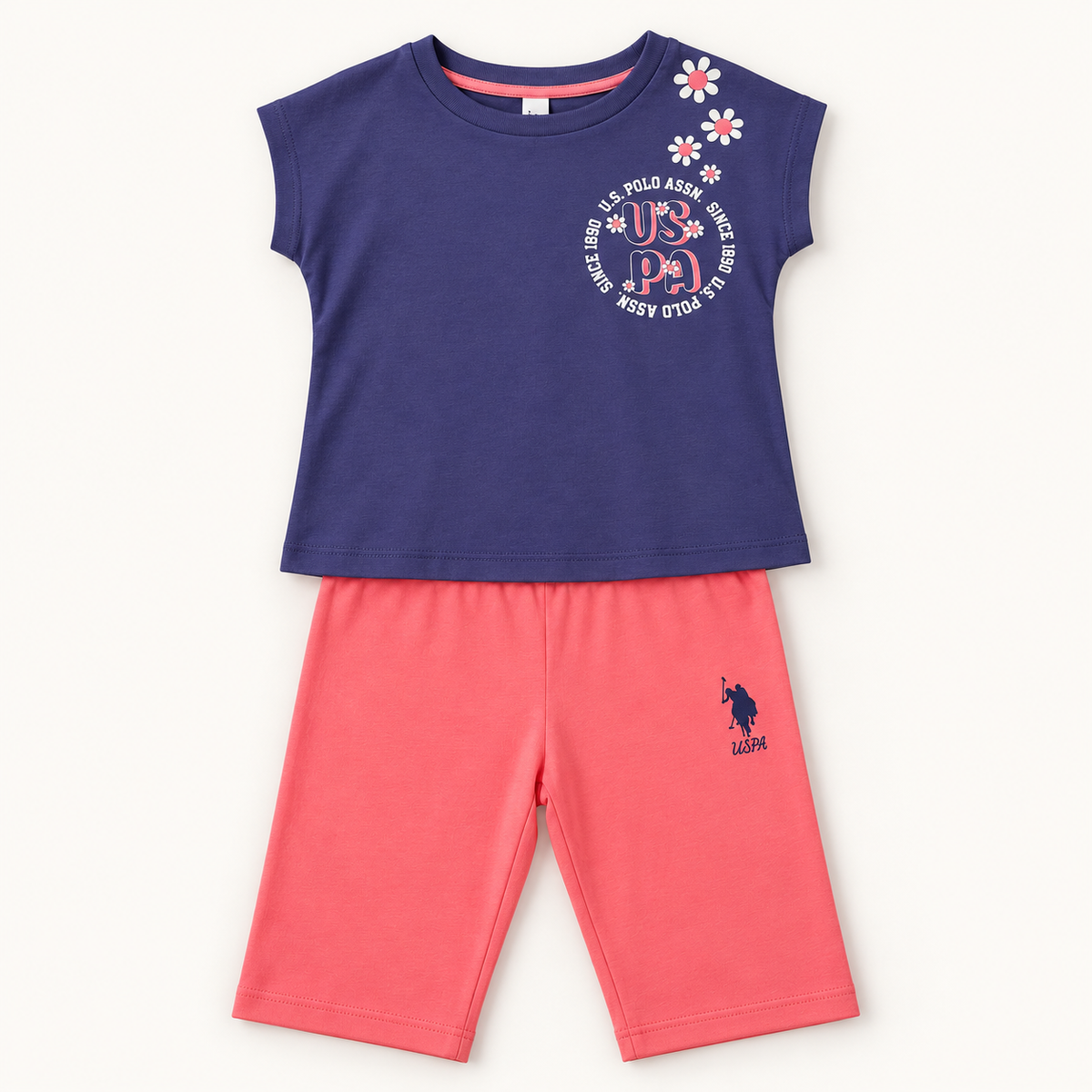 Ensemble fille US Polo t-shirt bleu marine et pantacourt rose – 4 à 8 ans